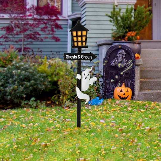 Glitzhome® 42" Lighted Halloween Haunted House Yard Stake with Timer